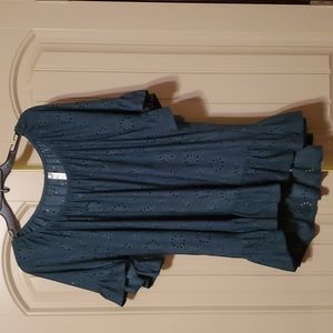 Green flowy ruffle bottom with a hi lo hem.